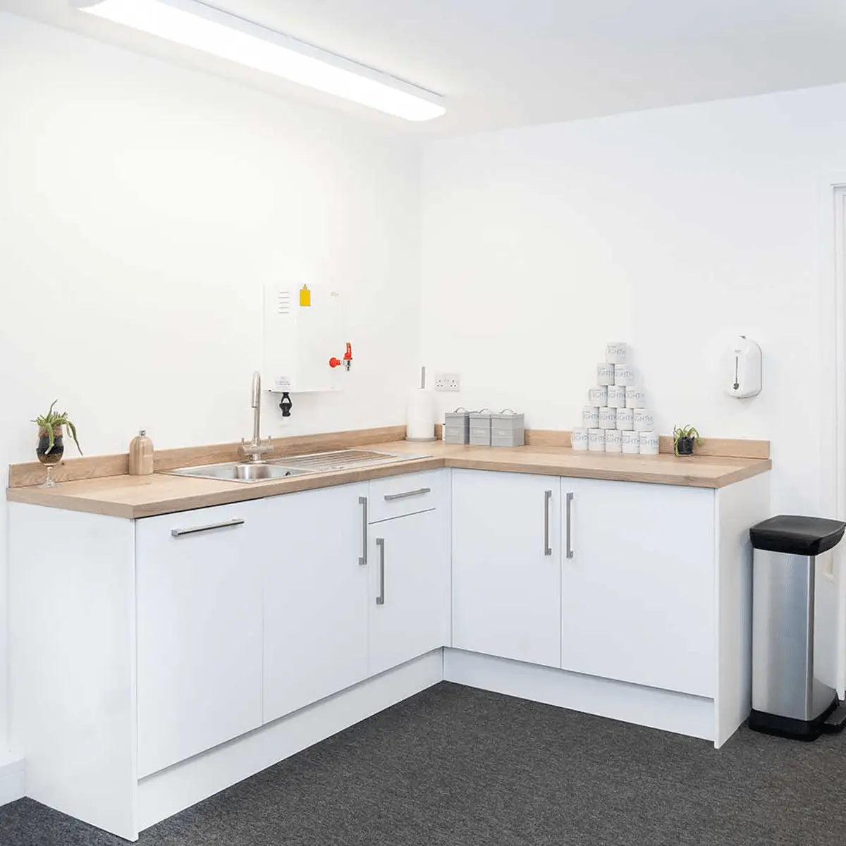 StudyLine LED Linear 5ft Commercial Batten installed within a workplace kitchen.