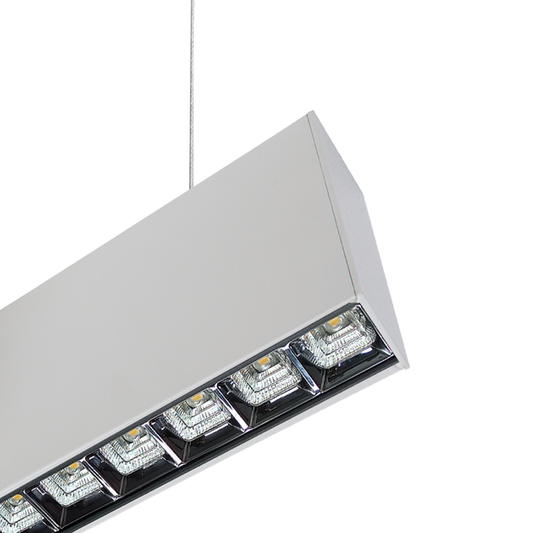 Close up of white square optics on the Proline ceiling fitting an optical solutions for led lighting.