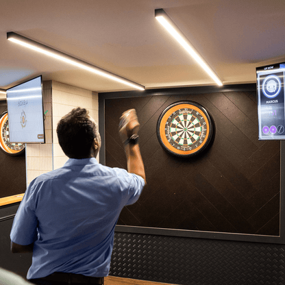 Straight linear ceiling mounted lights made bespoke for a darts room.