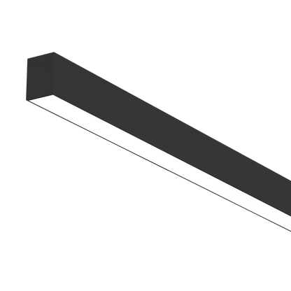 The linear black surface mounted Skyline light lit.